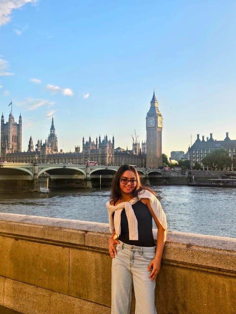 Chahak Goswami in London with Big Ben and the Houses of Parliament in the background
